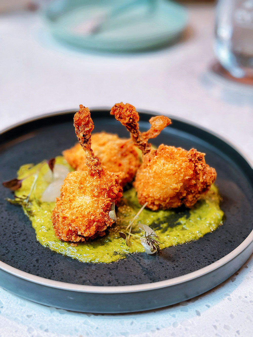 Photo of Frog Leg En Persillade dish at Vineyard Hortpark, Singapore. For review.