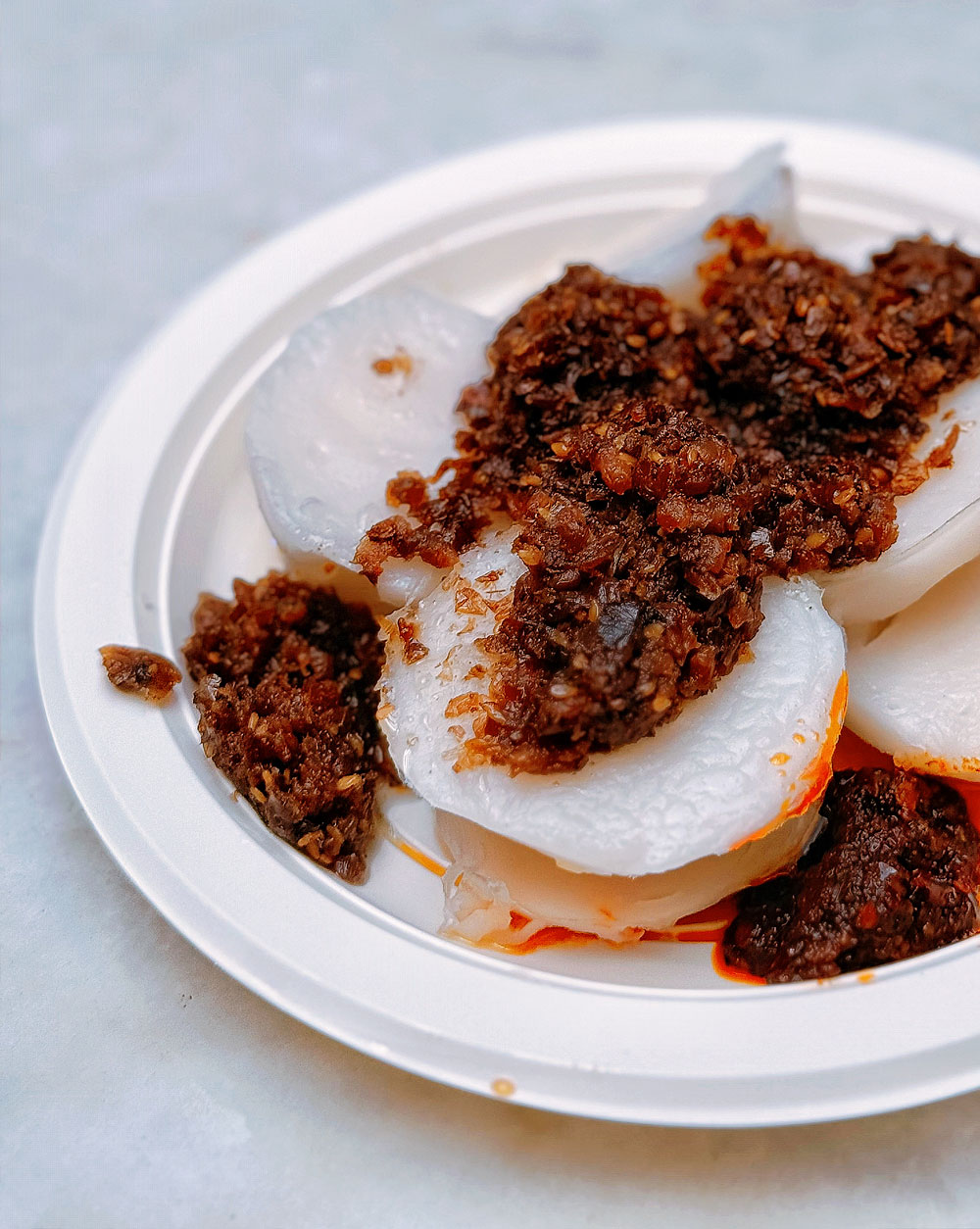 jian-bo-shui-kueh-chwee-kueh Close up Photo of Jian Bo Shui Kueh (Chwee Kueh) on a plate,